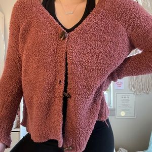 Fluffy pink cardigan sweater